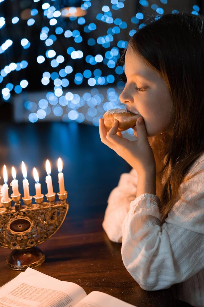 Girl Biting Sufganiyot