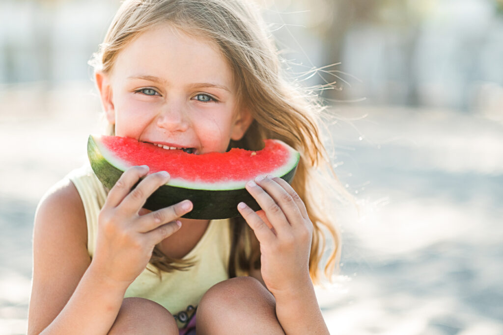 little girl eating watermelon, natural watermelon flavor
