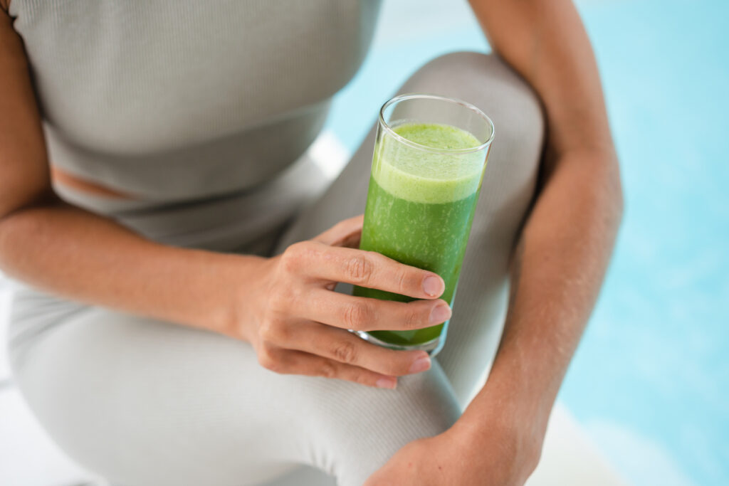 Woman Holding A Glass Of Healthy Smoothie